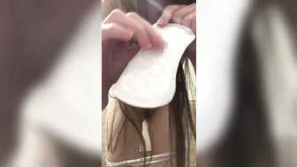 Girl puts on a panty liner and invites you to sniff it