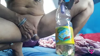 nippleringlover peeing in bottle naked in tent at nude beach - pierced tits & pierced pussy