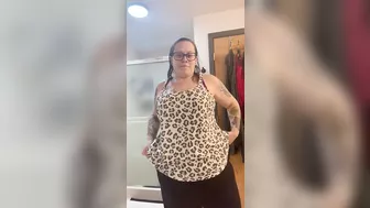 BBW MILF lotions thick body and gets dressed POV