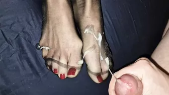 Big load on Red toes in black nylon