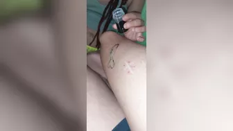 Tattooing his leg stick and poke