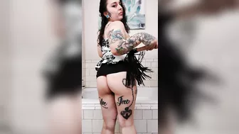 Slutty tattooed milf with whip