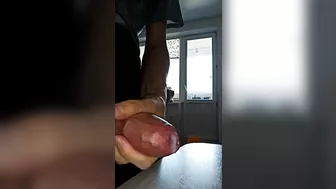 A big head of a large uncircumcised penis, smegma lubrication and a lot of sperm