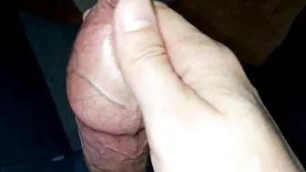 A big head of a large uncircumcised penis, smegma lubrication and a lot of sperm