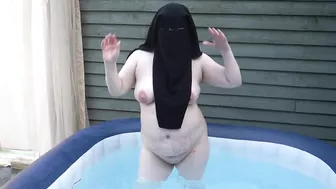 naked in Niqab in the hot tub