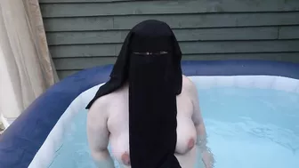 naked in Niqab in the hot tub