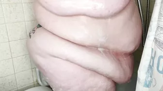 Watching my stepmother showing and masturbate with the shower head.