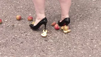 Crush fetish outdoors Fat legs in high heel shoes crush apples