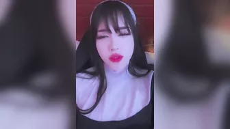 This horny nun plays with her pussy and a vibrator