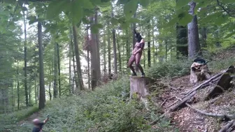 Standing pissing in a woods in a bunny mask and fishnet