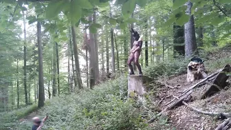 Standing pissing in a woods in a bunny mask and fishnet