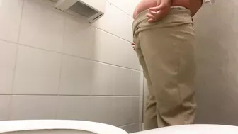 Girl Peeing at the work public toilet