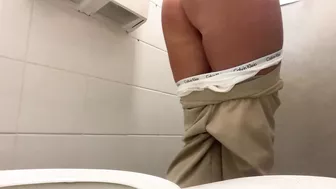 Girl Peeing at the work public toilet