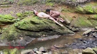 Naked Interracial Couple Fuck Outdoors on Riverbank