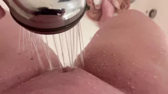 Girl using shower after wetting accident in shorts