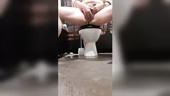 Masturbating and squirting piss on the floor in TGI Fridays