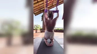 Gym girl works on flexibility - stretchy girl