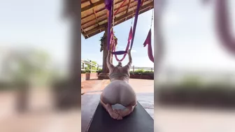 Gym girl works on flexibility - stretchy girl