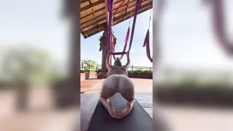 Gym girl works on flexibility - stretchy girl