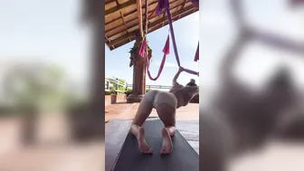 Gym girl works on flexibility - stretchy girl