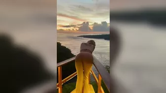 Bending over watching the sunset