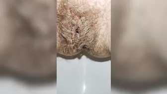 Delicious hairy pussy pissing mega close up