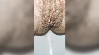 Delicious hairy pussy pissing mega close up