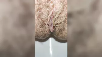 Delicious hairy pussy pissing mega close up