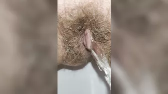 Have you seen what a hairy pissing pussy looks like close up?