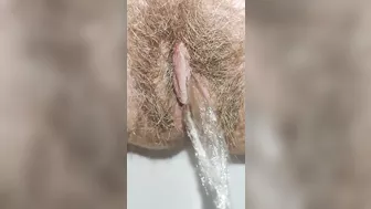 Have you seen what a hairy pissing pussy looks like close up?