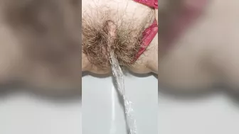 Schoolgirl with small ass but big hairy pussy pissing for you super mega closeup