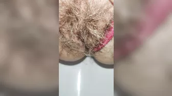 Schoolgirl with small ass but big hairy pussy pissing for you super mega closeup