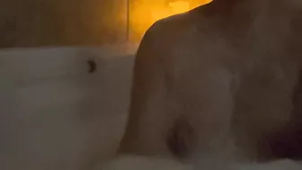 Playing with my perky boobs in the bath