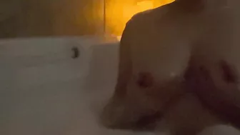 Playing with my perky boobs in the bath