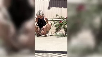 Piss Slut pissing by her roses!