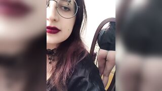 Pretty girl with glasses shows her ass.