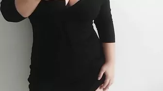 Busty MILF masturbates while standing