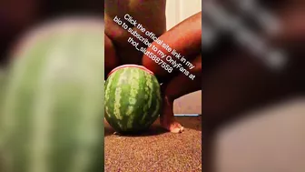 Stretched out pussy lips shoved around huge watermelon