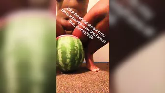 Stretched out pussy lips shoved around huge watermelon