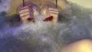 Hot MILF Step Mom in the Hot Tub. Teasing and showing off titties.