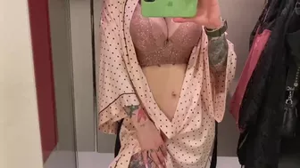 student trying on a bra on huge boobs