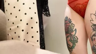 student trying on a bra on huge boobs