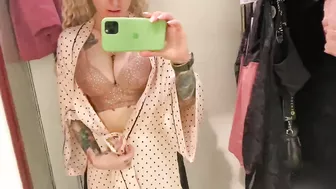 student trying on a bra on huge boobs