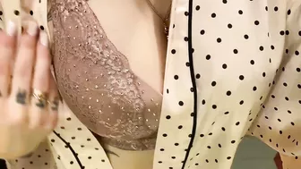 student trying on a bra on huge boobs