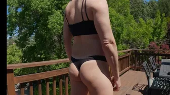 Trying on an xdress thong and top